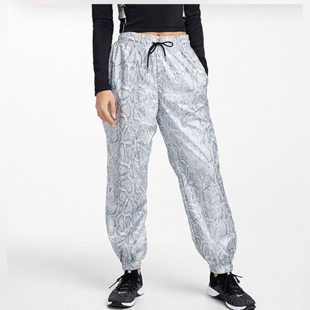 NIKE DRI FIT PYTHON PRINT TRACK PANTS SIZE S